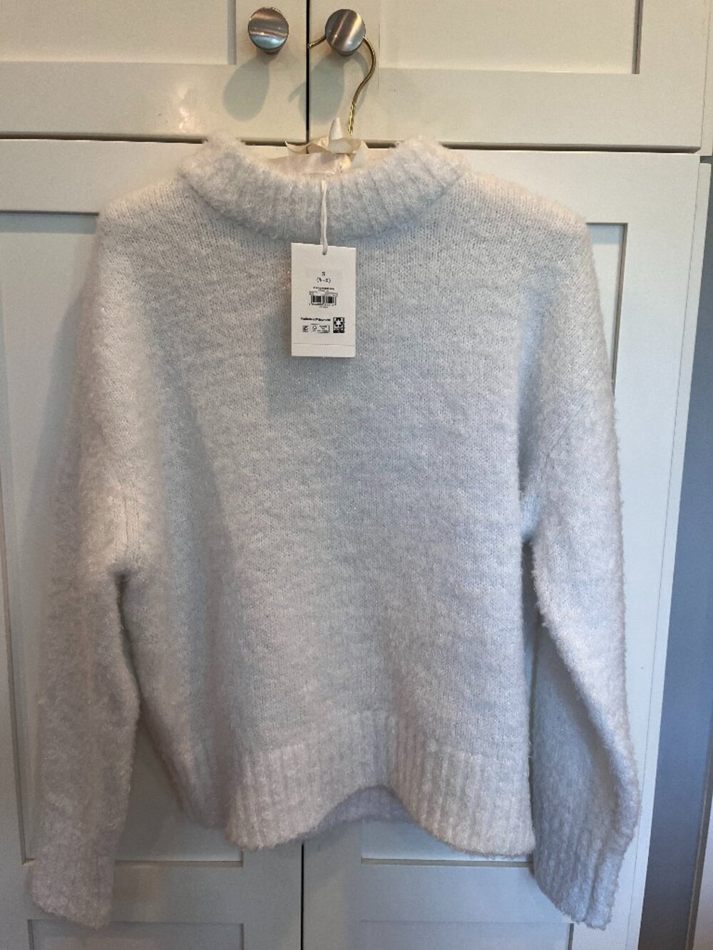 White sweater with silver specks
